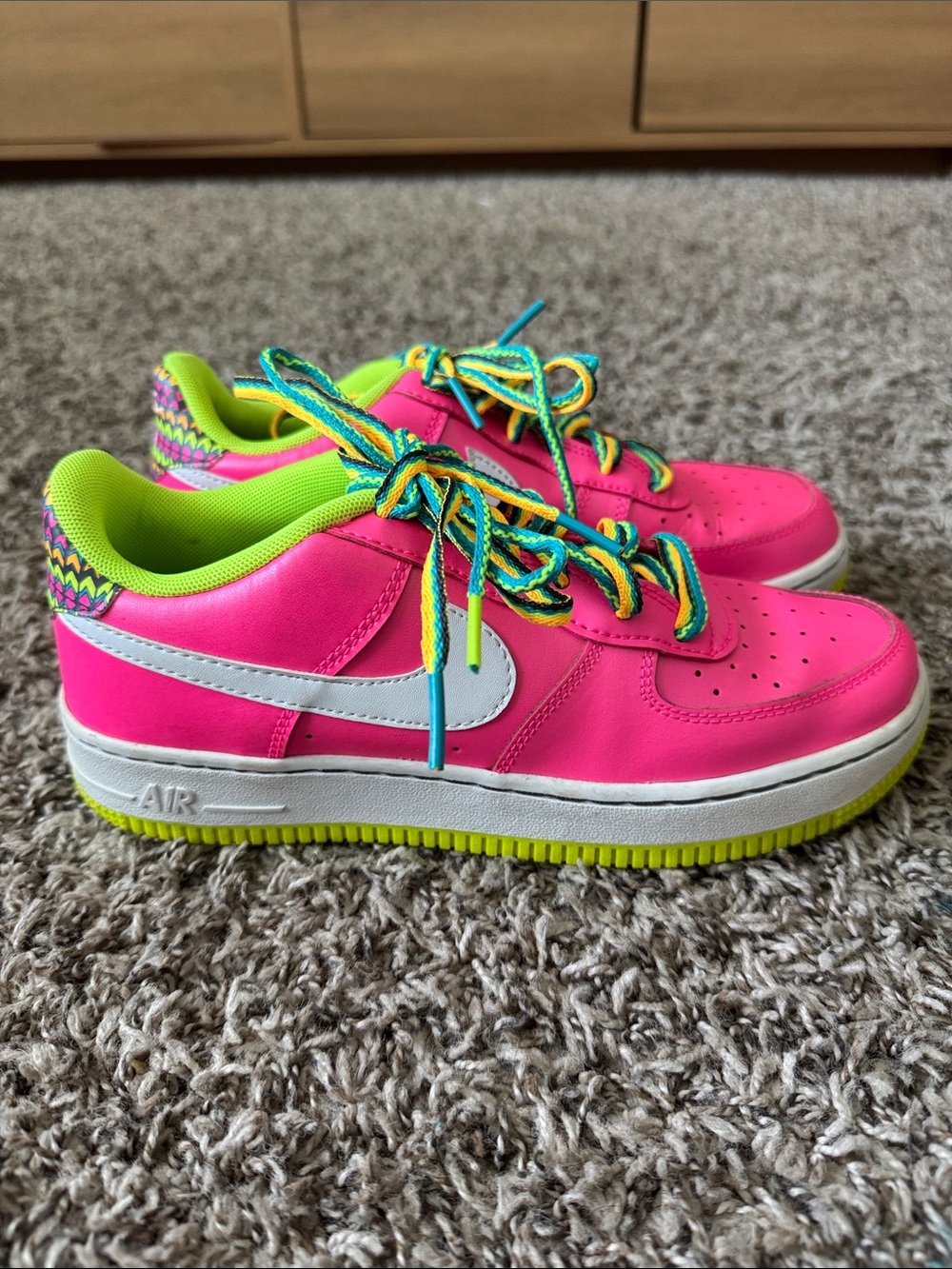 Nike Kids Pink Sneakers with White Swoosh and Neon Green Accents